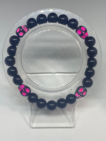 Neon pink skull bracelet