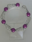 Fancy sliver bead with solid purple bracelet