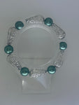 Fancy sliver bead with solid blue/green beads bracelet