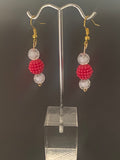 Red with white earrings