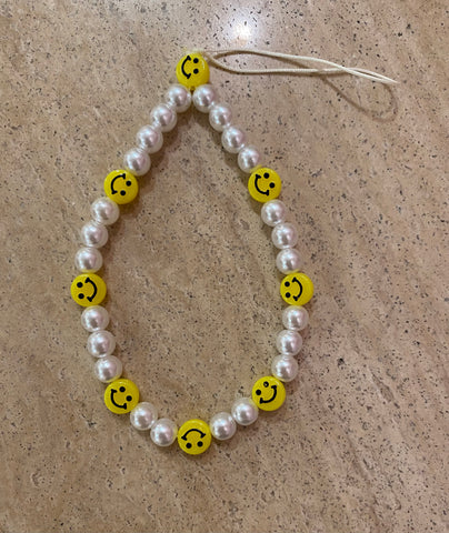 Smiley faces phone charm