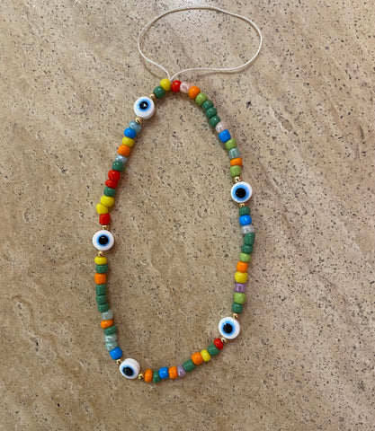 Multi-color small beads with white evil eye phone charm