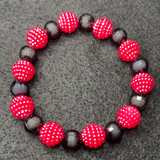 Red/hot pink fancy pearls and black pearls