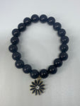 Black Dangling daisy bracelet 