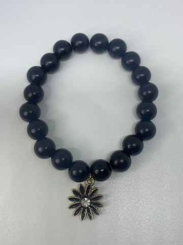 Black Dangling daisy bracelet 