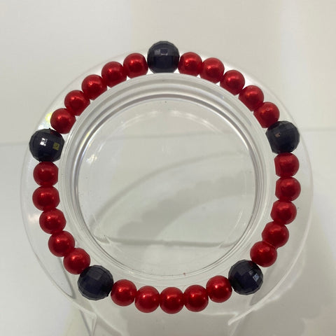 Red solid beads with shiny black bracelet