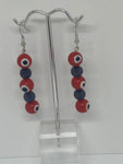 Red evil eye pearl with black pearls Earrings