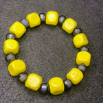 Yellow squared with black bracelet