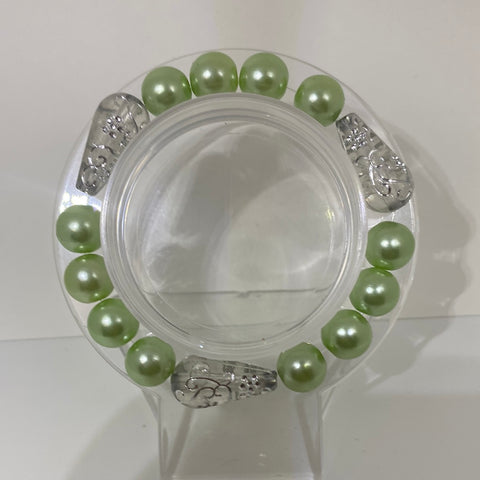 Green solid green beads with clear with sliver with oval bracelet