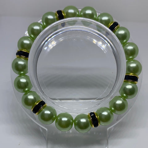 Green solid beads with black beads