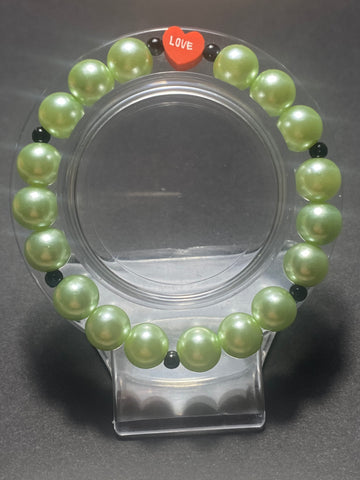 Solid green beads with black small shiny beads 