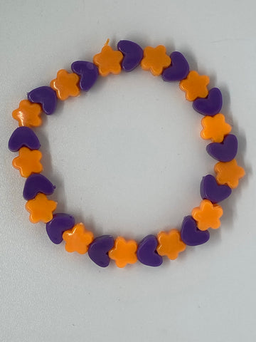 Orange flower beads and purple heart beads