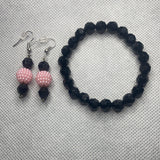 Black bracelet with light pink earrings 