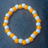 Orange and white bracelet