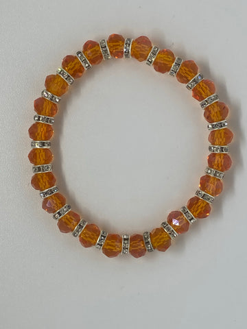 Orange beads with shiny diamonds 