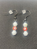 White bead with red evil eye bead (small earrings)