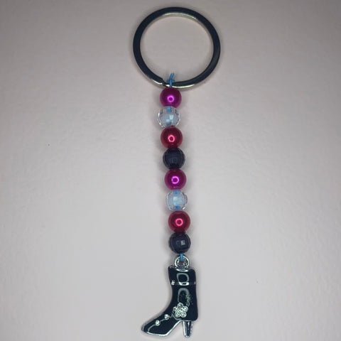 Hot pink ,white ,black ,and red beads with dangling black heel Keychain