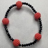 Orange and black bracelet