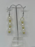 White and gold pearl earrings