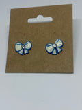 White bow with baby blue outline stud earrings