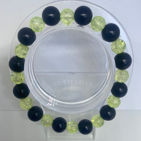 Black solid bead with lime green glass bead 
