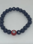 Black bracelet with evil eye 