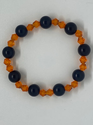 Shiny orange and solid black bracelet