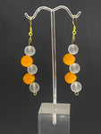 Clear pearl with orange bead Dangling earrings