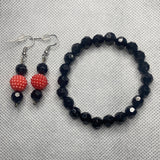 Black bracelet with black earrings with red pearl and black bracelet