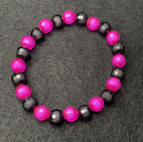 Pink and black shiny beads