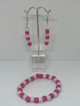 Pink and white earrings and bracelet