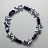 Gray stars with solid black pearls bracelet