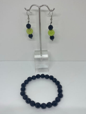 Black bracelet with black earrings with lime green pearls