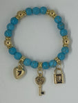 Blue with gold lock,key, and heart bracelet