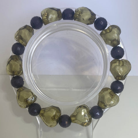 : Green heart shape beads with black beads in between Bracelet