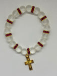 Clear pearl with shiny red diamonds with dangling gold cross Bracelet