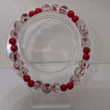 Clear with red spots with red solid bracelet