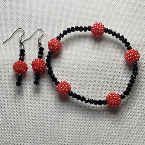 Orange and black earrings and bracelet